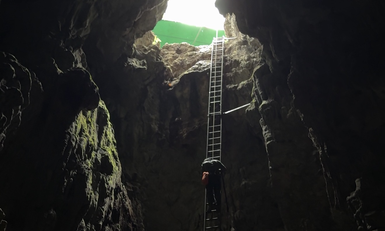 Interior of a cave with stalactite and stalagmite formations